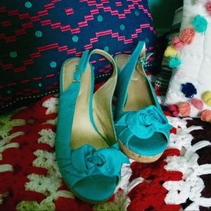 Teal high heel wedges.